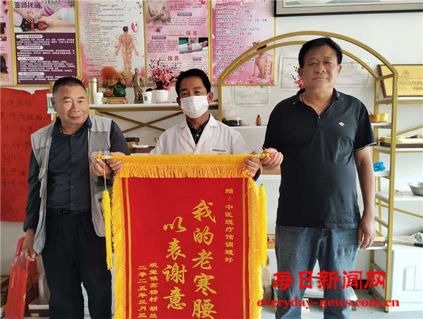 发展中医事业传承中医文化 一一记何长中和